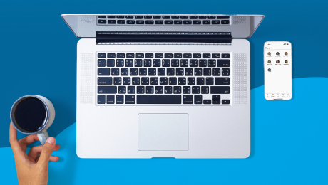 Hand using laptop trackpad — system running automatically